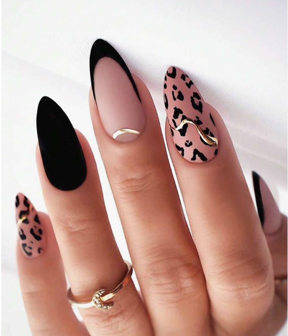 Nails with black, nude, and leopard print designs
