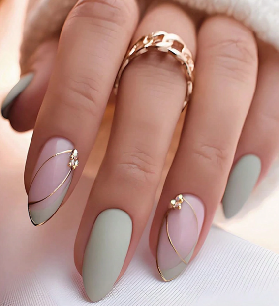 Green and pink nails featuring gold designs